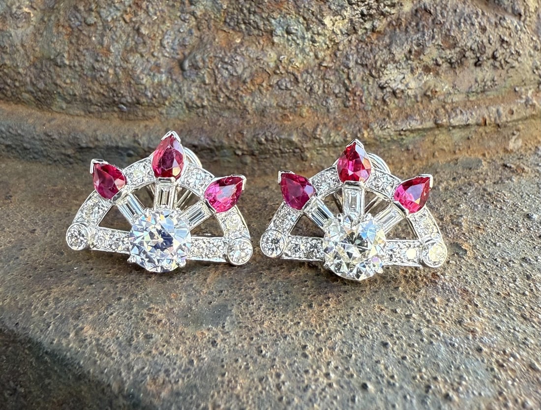 Art Deco Platinum Earrings With GIA Pear Ruby and Old Cut Diamond Accents: Art Deco Platinum Earrings With GIA Pear Ruby and Old Cut Diamond Accents These antique Art Deco fan earrings feature a striking combination of natural and laboratory-grown rubies and old European cut