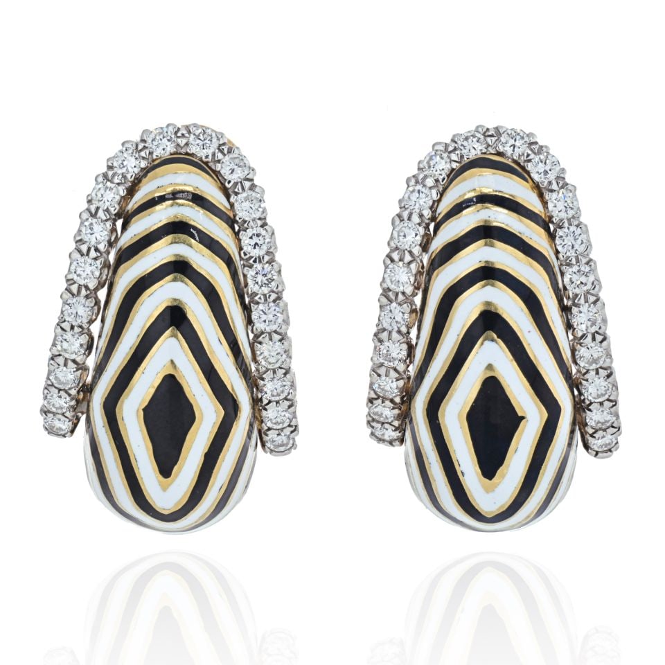 David Webb Vreeland Zebra Diamond Earrings in Platinum Gold: David Webb Vreeland Zebra Diamond Earrings in Platinum Gold Elevate your style with these stunning David Webb Vreeland Diamond Zebra Earrings. Crafted from a luxurious combination of platinum and 18K 