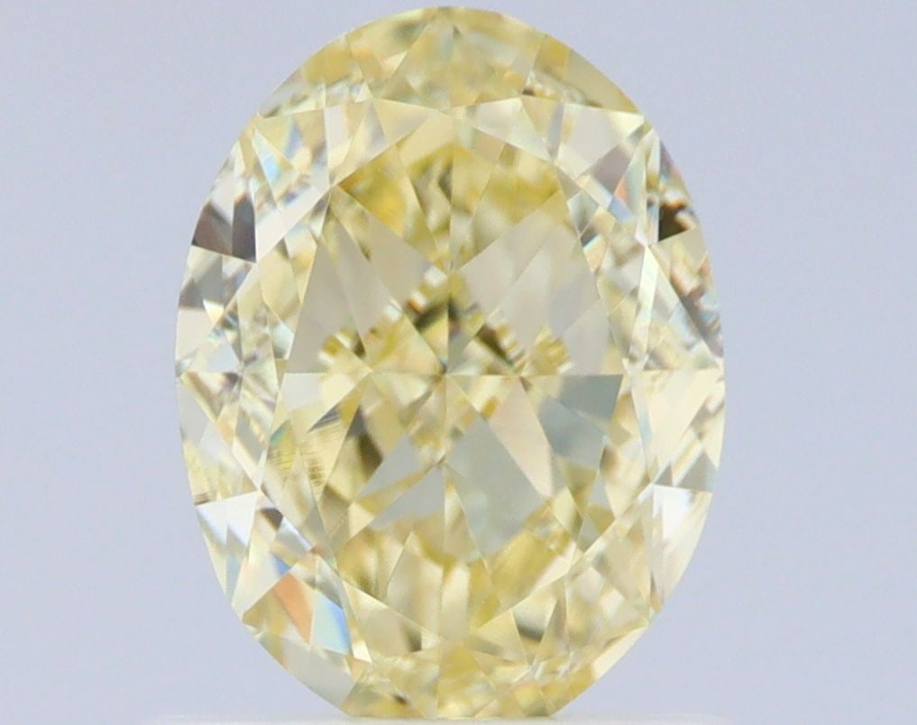 Loose Diamond - OVAL 1.01ct Fancy Light Yellow VVS2: Loose Diamond - OVAL 1.01ct Fancy Light Yellow VVS2 Source: Natural Shape: OVAL Carats: 1.01 Color: Fancy Light Yellow Certification: GIA Video: