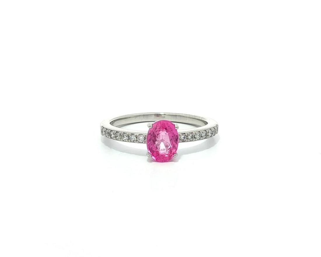 New Platinum GIA Certified 1.14ctw Oval Pink Sapphire Diamond Ring: New Platinum GIA Certified 1.14ctw Oval Pink Sapphire Diamond Ring This stunning engagement wedding ring features a natural oval pink sapphire at its center, weighing 1.0ct. The vivid pink sapphire is