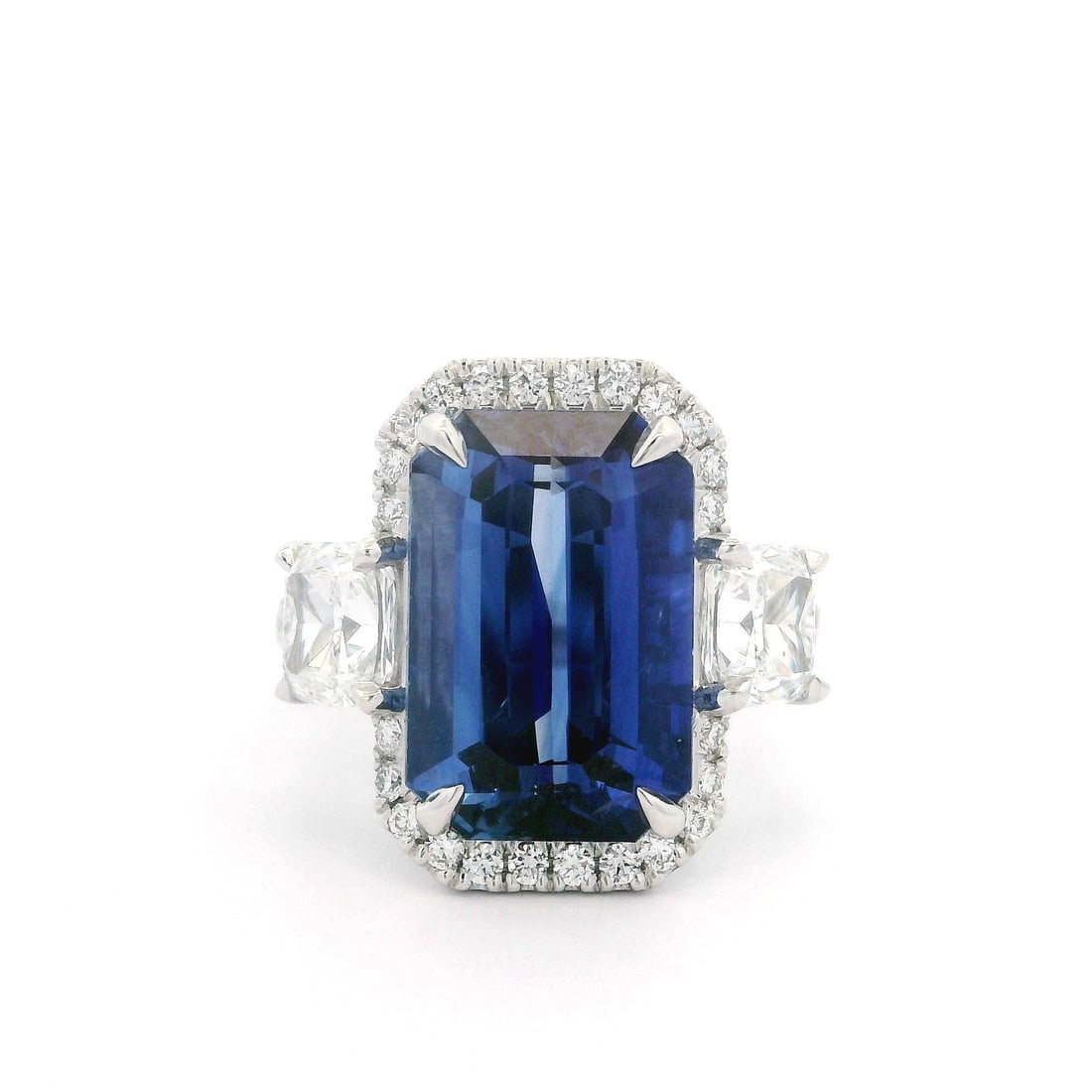 Custom Made Platinum GIA Certified 10.19ctw Emerald Cut Sapphire Diamond Ring: Custom Made Platinum GIA Certified 10.19ctw Emerald Cut Sapphire Diamond Ring This exquisite custom-made cocktail ring features an elongated emerald cut sapphire, elegantly prong set in solid platinum