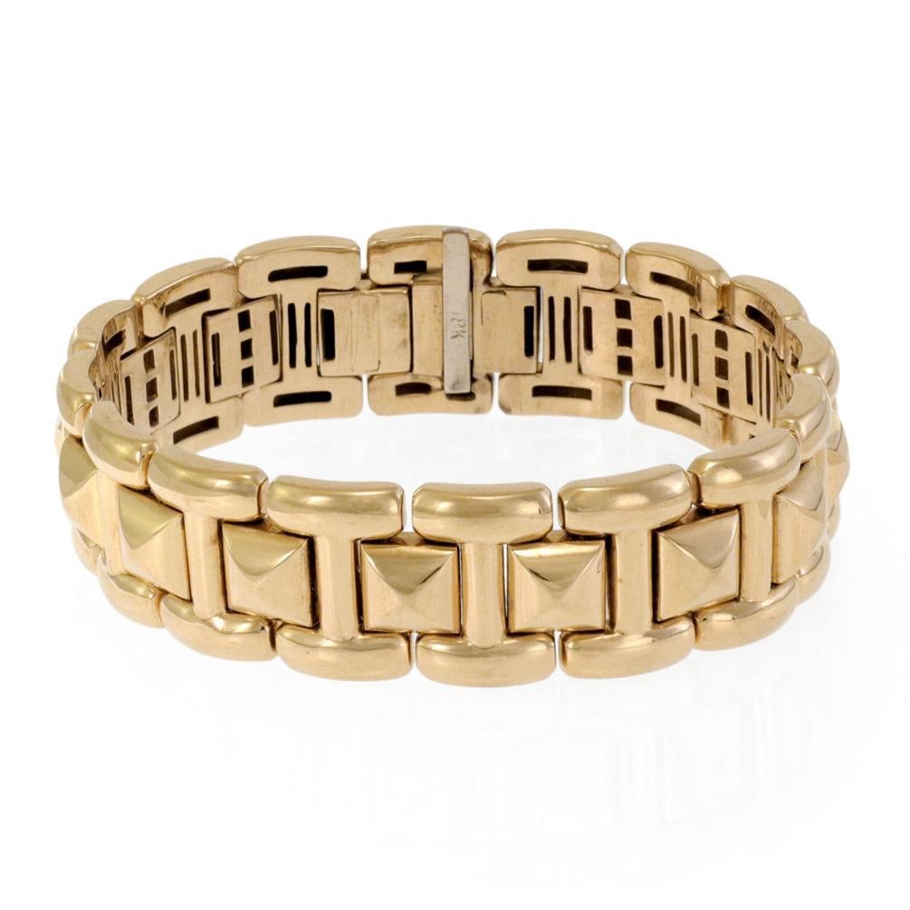 18k Yellow Gold Pyramid Link Bracelet 7in French Hallmarked: 18k Yellow Gold Pyramid Link Bracelet 7in French Hallmarked This exquisite 18k yellow gold bracelet features a striking pyramid link design. The bracelet is crafted with French hallmarks on the slide 