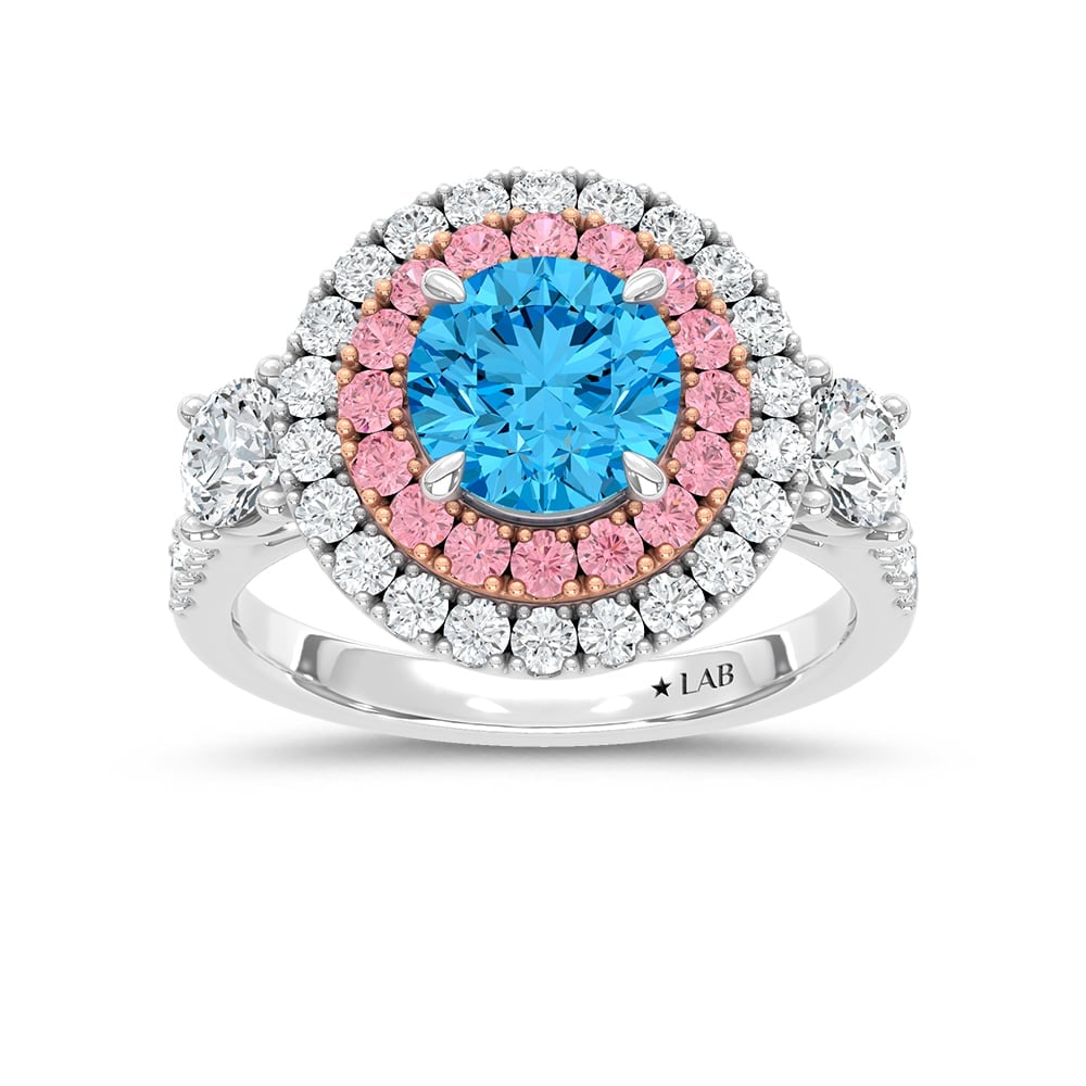 14K Two Tone Lab Grown Diamond 3 1/10 Ct.Tw. Blue Round Engagement Ring (Center 1 5/8ct): 14K Two Tone Lab Grown Diamond 3 1/10 Ct.Tw. Blue Round Engagement Ring (Center 1 5/8ct) Exude sophistication with this 14K Two-Tone Gold Engagement Ring, featuring a striking 1 5/8-carat lab-grown bl