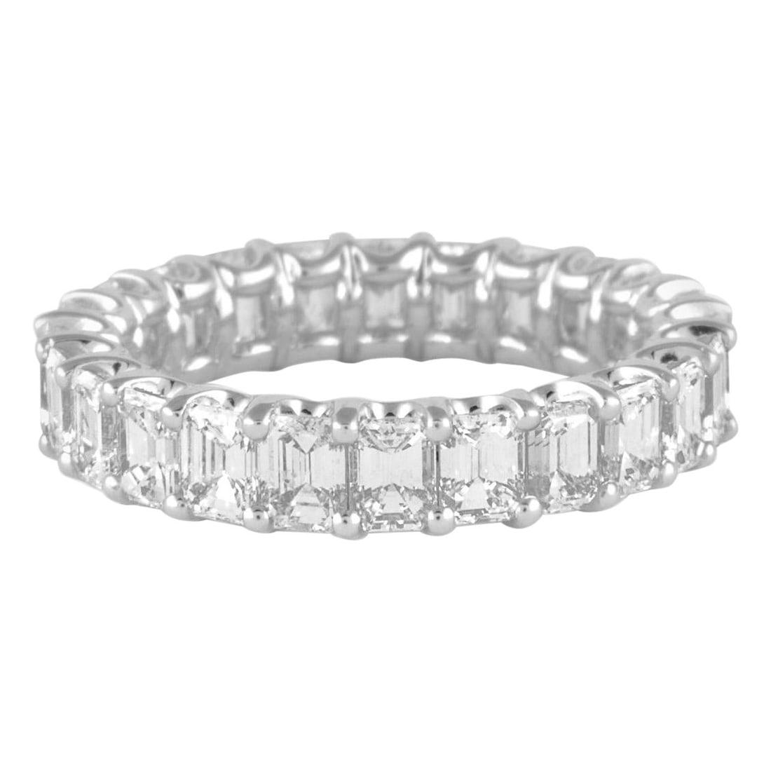 3.97ct Emerald Cut Diamond Eternity Band 18k White Gold: 3.97ct Emerald Cut Diamond Eternity Band 18k White Gold This stunning emerald cut diamond eternity band features 24 exquisite emerald cut diamonds totaling 3.97 carats. Set in 18k white gold, this con