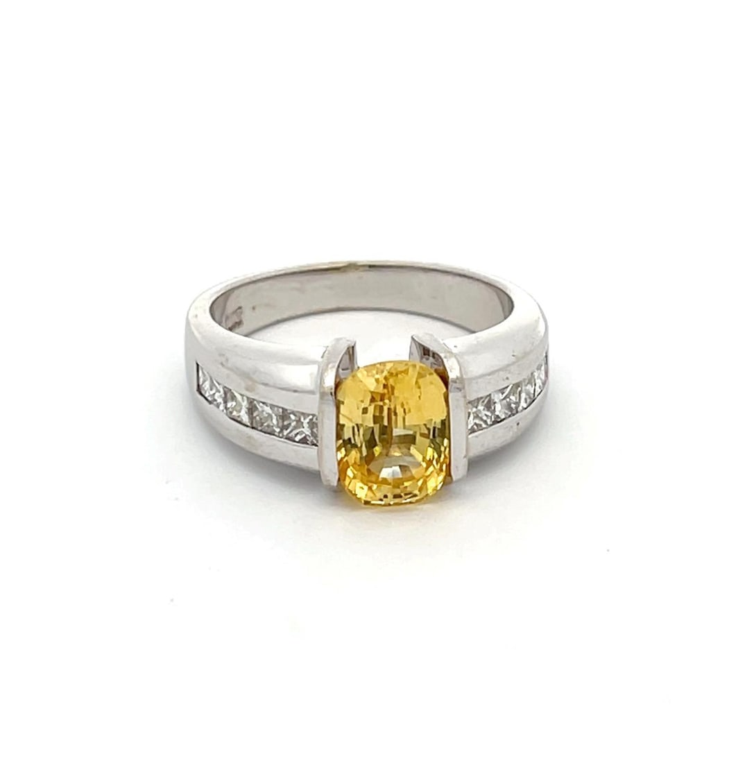Elegant 14k White Gold Yellow Sapphire Diamond Ring Size 6.25: Elegant 14k White Gold Yellow Sapphire Diamond Ring Size 6.25 This elegant ring features a stunning half bezel set oval yellow sapphire at its center, surrounded by approximately 65 points of invisibl
