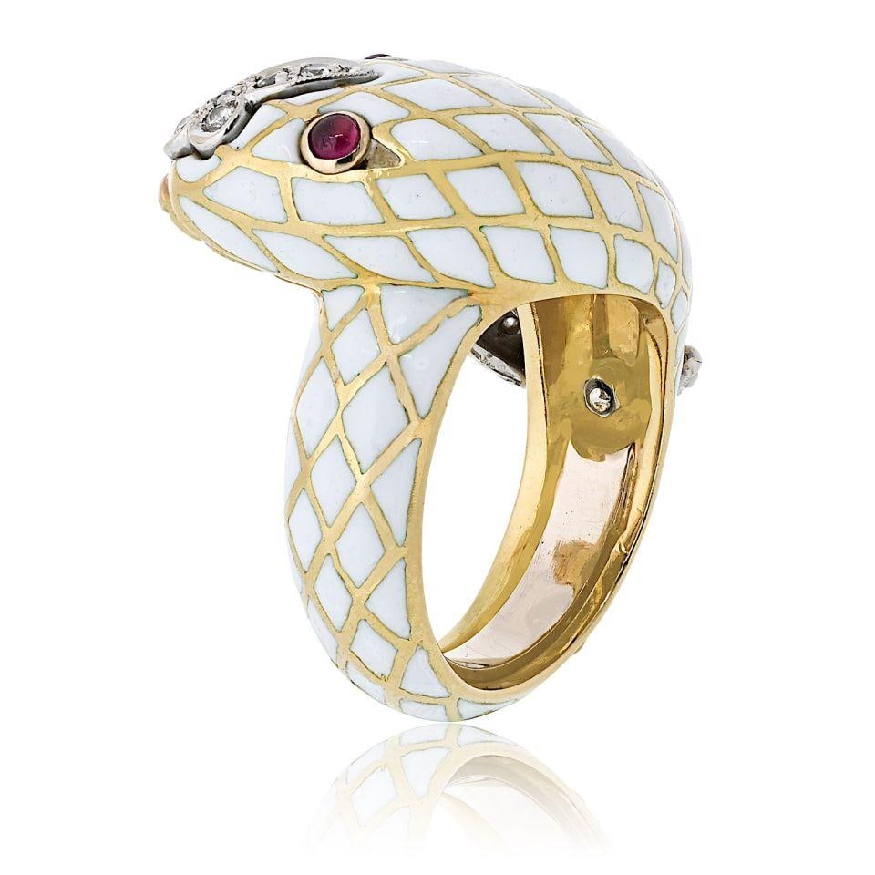 David Webb 18K Gold Snake Ring with Enamel Ruby and Diamonds: David Webb 18K Gold Snake Ring with Enamel Ruby and Diamonds This stunning David Webb 18K Yellow Gold Snake Serpent Ring features a lifelike design that elegantly coils around the finger. The ring is 