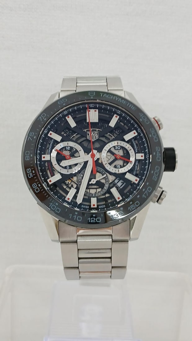 TAG Heuer CBG2A10 Carrera Calibre Heuer 02 mens chronograph watch: TAG Heuer CBG2A10 Carrera Calibre Heuer 02 mens chronograph watch Pre-owned TAG Heuer Carrera Calibre Heuer 02 chronograph men's wristwatch. Swiss-made and identified as a TAG Heuer Carrera Calibre He