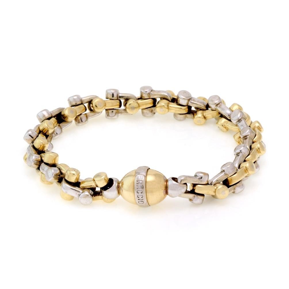 Braccio 14k Gold Hefty Stirrup Link Bracelet 76.6g: Braccio 14k Gold Hefty Stirrup Link Bracelet 76.6g This exquisite bracelet, designed by the renowned Italian jeweler Braccio, showcases a hefty construction in 14k yellow and white gold. Its unique st