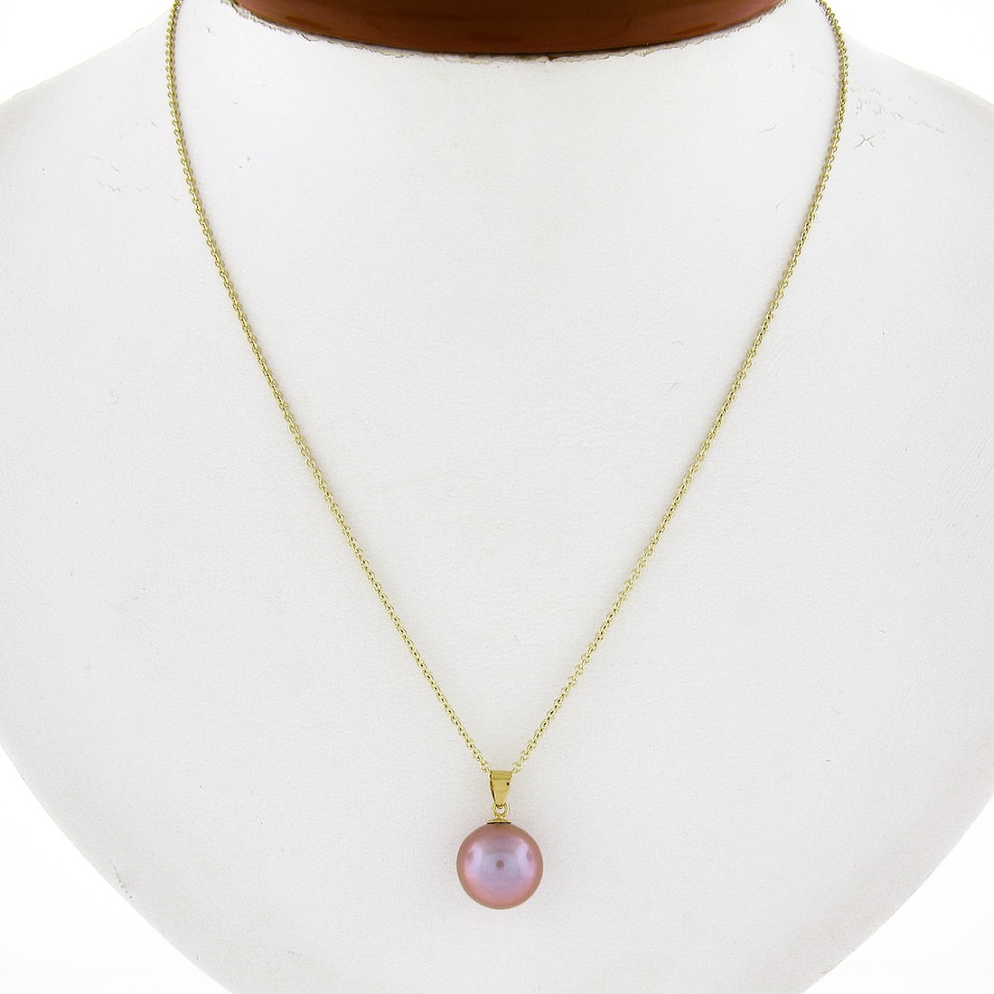 Unbranded Cultured Pink Pearl Pendant Necklace in 18K Yellow Gold 18in Chain: Unbranded Cultured Pink Pearl Pendant Necklace in 18K Yellow Gold 18in Chain Elegant and timeless, this pre-owned necklace features a solitaire cultured pink pearl pendant in solid 18k yellow gold. Th