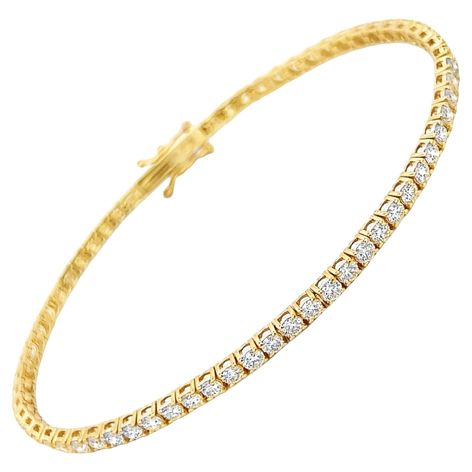 3.57ct Diamond Tennis Bracelet in 14k Yellow Gold: 3.57ct Diamond Tennis Bracelet in 14k Yellow Gold This exquisite 3.57ct diamond tennis bracelet showcases the perfect blend of elegance and contemporary style. Crafted in 14k yellow gold, it features 