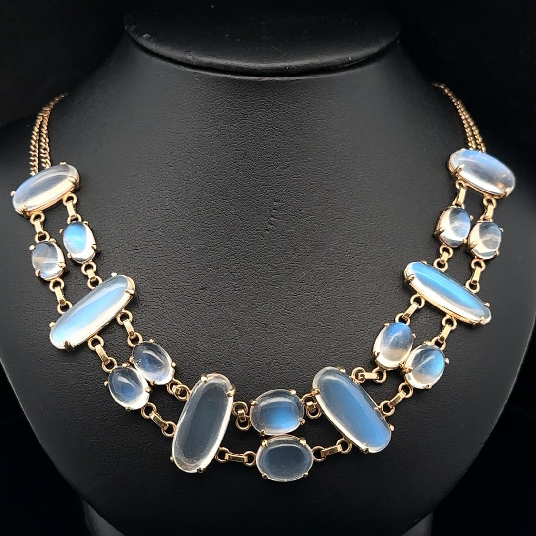 Vintage 15 Inch Yellow Gold Dual Curb Link Necklace with Blue Moonstone: Vintage 15 Inch Yellow Gold Dual Curb Link Necklace with Blue Moonstone This exquisite vintage collar necklace features a striking combination of rosy yellow gold and stunning blue moonstones. The nec
