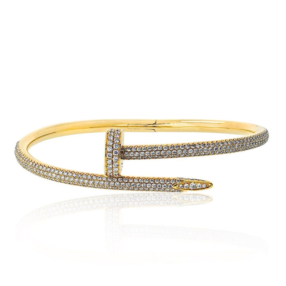 Cartier Juste Un Clou Pave Diamond Bracelet in 18K Yellow Gold Size 17: Cartier Juste Un Clou Pave Diamond Bracelet in 18K Yellow Gold Size 17 This Cartier Juste un Clou bracelet is crafted from 18K yellow gold and features a bold nail motif adorned with pave diamonds. Th