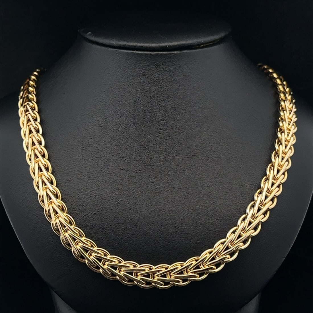 17 Inch 14k Yellow Gold Chevron and Round Diamond Accent Vintage Necklace: 17 Inch 14k Yellow Gold Chevron and Round Diamond Accent Vintage Necklace This vintage necklace features a chevron and round link design crafted from solid 14k yellow and white gold. The necklace is a