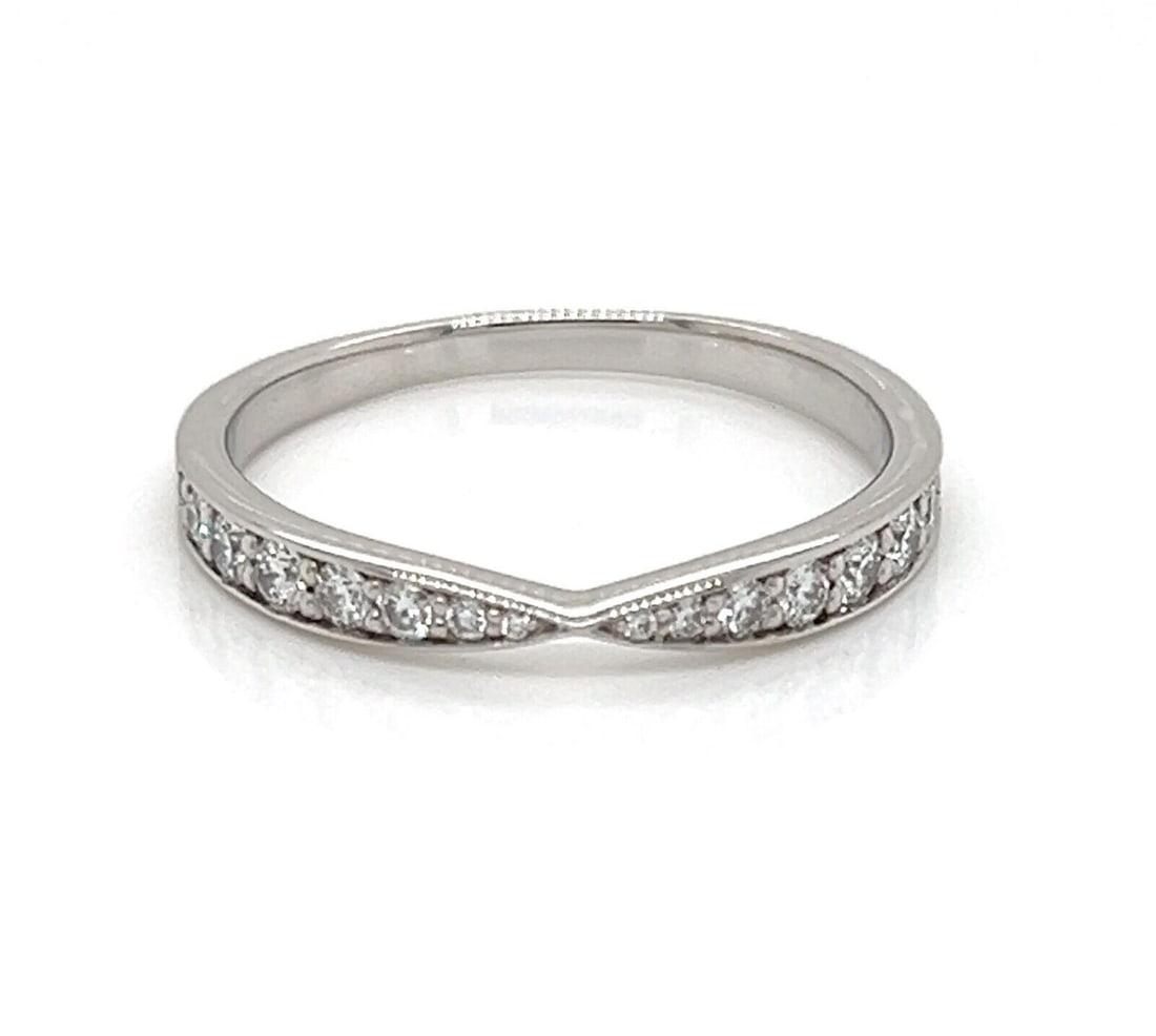Platinum Diamond Band Ring Tiffany & Co. Harmony Size 5.5: Platinum Diamond Band Ring Tiffany & Co. Harmony Size 5.5 A Tiffany & Co. Harmony diamond band ring crafted in platinum with a slender silhouette and round brilliant diamond accents across the front. 