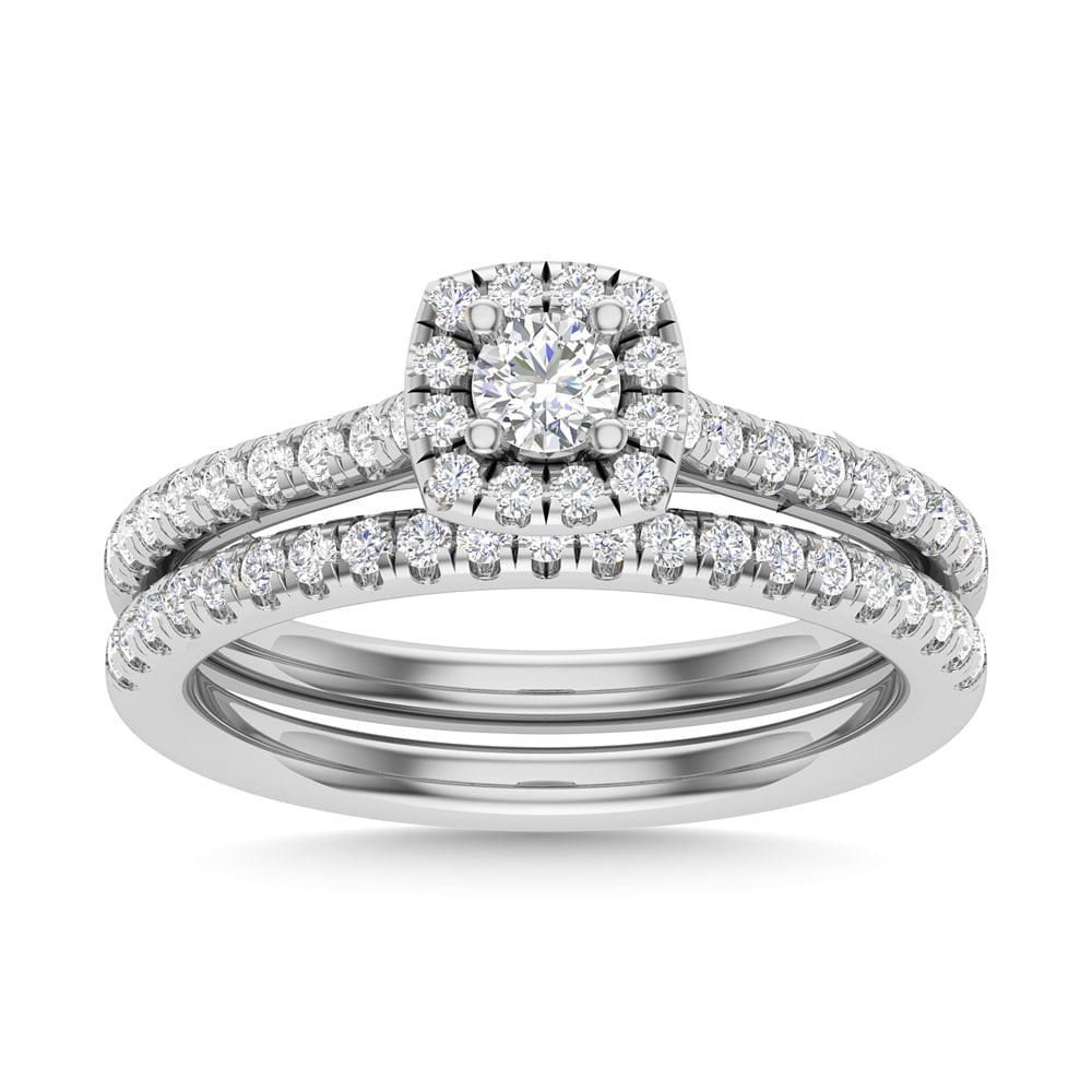 Diamond 3/4 Ct.Tw. Round Cut Bridal Ring in 14K White Gold: Diamond 3/4 Ct.Tw. Round Cut Bridal Ring in 14K White Gold Diamond 3/4 Ct.Tw. Round Cut Bridal Ring in 14K White Gold 14k White Gold Stone Color: G-h Stone Clarity: I2 Each ring is presented in standa