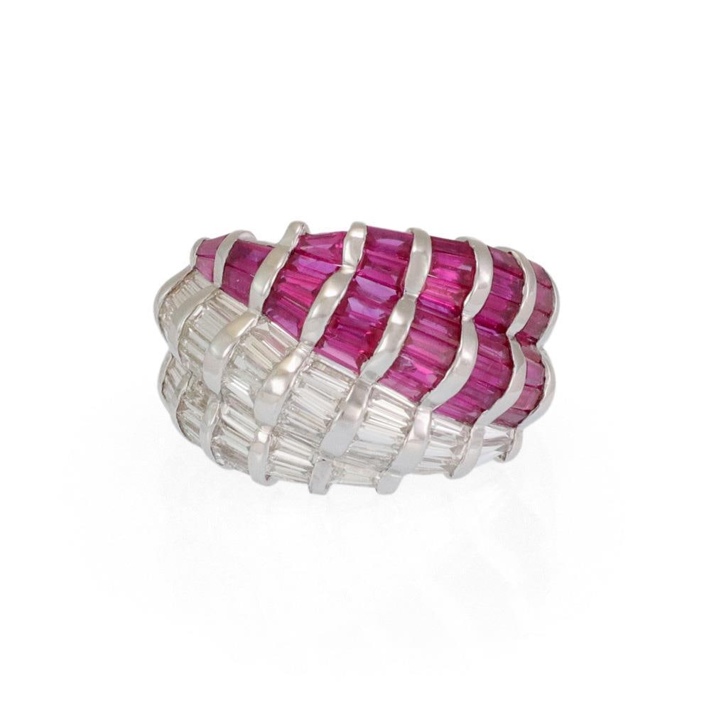 18k White Gold Dome Ring with Baguette Rubies and Diamonds Size 7: 18k White Gold Dome Ring with Baguette Rubies and Diamonds Size 7 This stunning dome-shaped ring is crafted from 18k white gold, featuring a unique four-row design. The front of the band showcases two