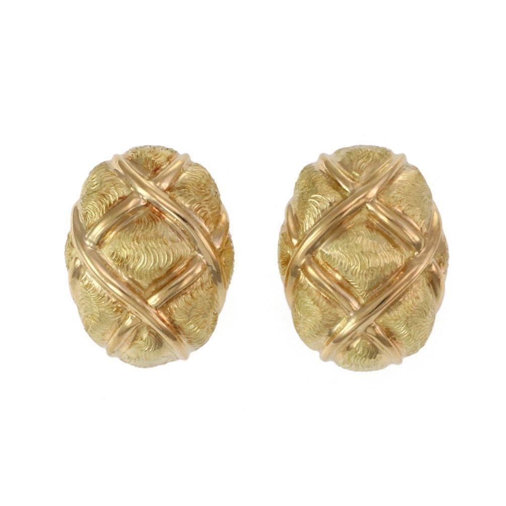 Tiffany & Co. 18k Yellow Gold Crisscross Dome Earrings: Tiffany & Co. 18k Yellow Gold Crisscross Dome Earrings Elevate your style with these stunning earrings from Tiffany & Co., expertly crafted from 18k yellow gold. These earrings feature an elegant oval