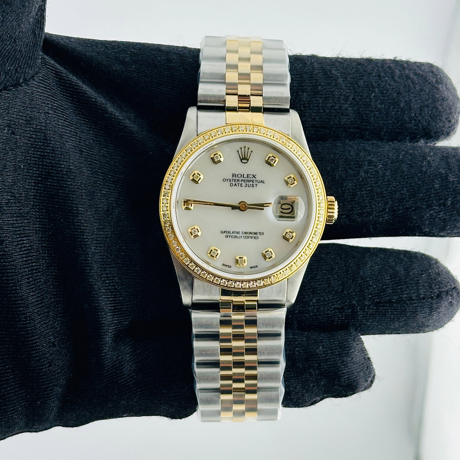 Rolex Datejust aftermarket White MOP Diamond Dial Jubilee Bracelet Ref 16013: Rolex Datejust aftermarket White MOP Diamond Dial Jubilee Bracelet Ref 16013 This men's Rolex Datejust features an aftermarket white mother-of-pearl diamond dial and an aftermarket Jubilee bracelet. T