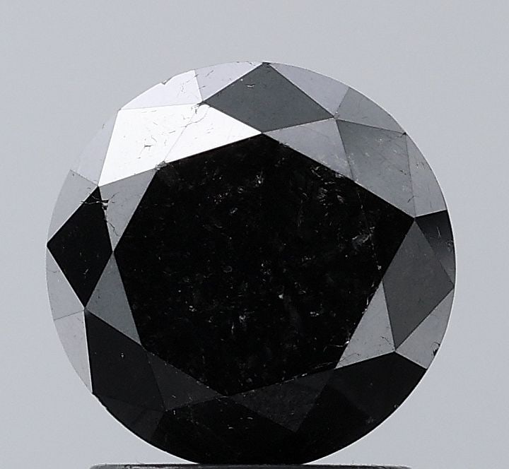 Loose Diamond - ROUND 1.79ct Black VVS2: Loose Diamond - ROUND 1.79ct Black VVS2 Source: Natural Shape: ROUND Carats: 1.79 Color: Black Certification: NONE Video: Video Link PLEASE NOTE: Framed, Large, or heavy items do not have shipping
