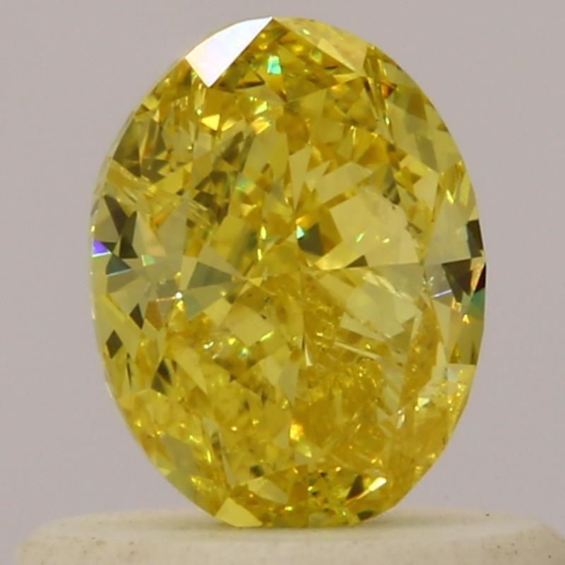 Loose Diamond - OVAL 0.5ct Fancy Vivid Yellow: Loose Diamond - OVAL 0.5ct Fancy Vivid Yellow Source: Natural Shape: OVAL Carats: 0.5 Color: Fancy Vivid Yellow Certification: GIA Video: