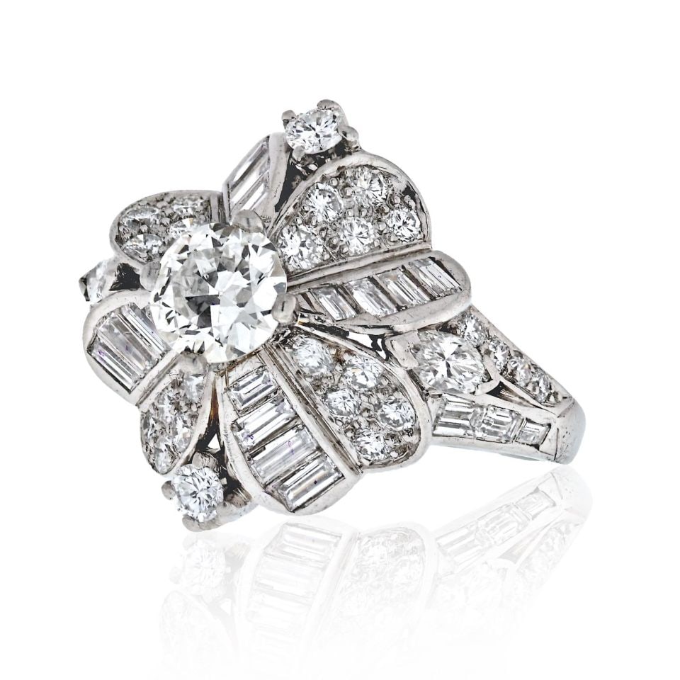 Mid Century Platinum Cluster Diamond Ring 2.5 Carats 55 Diamonds: Mid Century Platinum Cluster Diamond Ring 2.5 Carats 55 Diamonds Presenting a stunning Mid Century platinum cluster diamond ring that embodies true vintage elegance. This exquisite piece features a to