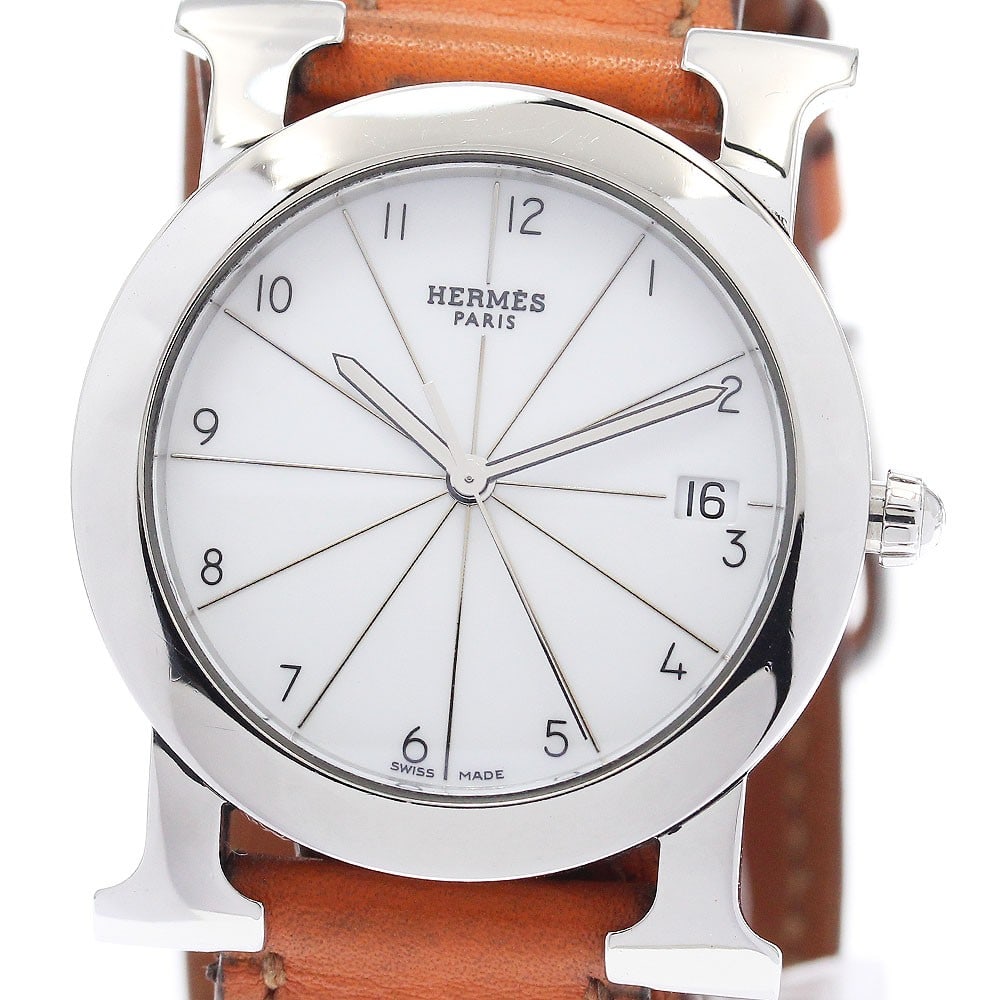 Hermes H-Watch Ronde Date Quartz Womens Stainless Steel Watch HR1.510: Hermes H-Watch Ronde Date Quartz Womens Stainless Steel Watch HR1.510 This Hermes H-Watch Ronde Date quartz wristwatch is crafted for women and features a stainless steel case paired with a white dial