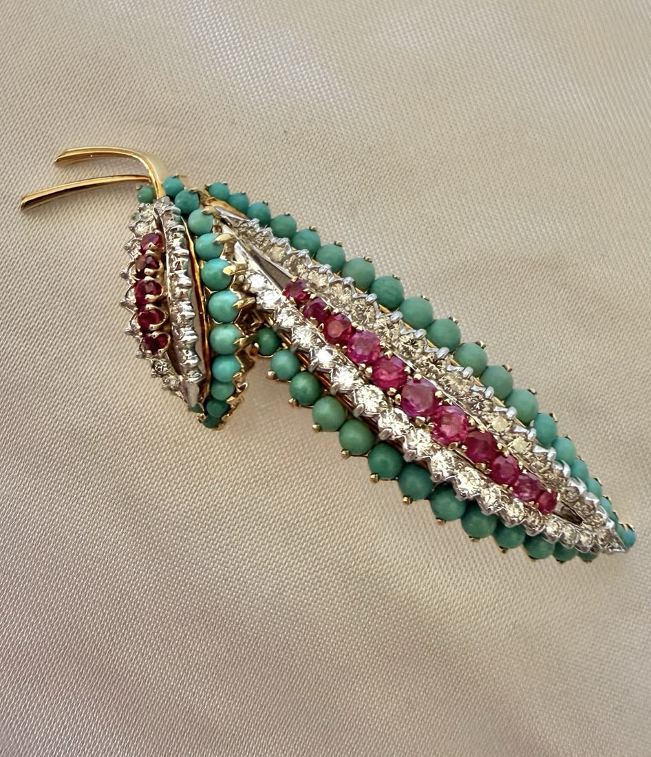 Antique French Brooch in Platinum 18K Gold with Diamonds Rubies and Turquoise: Antique French Brooch in Platinum 18K Gold with Diamonds Rubies and Turquoise This exquisite French brooch from the 1900s is crafted from platinum and 18k yellow gold, featuring a harmonious array of 