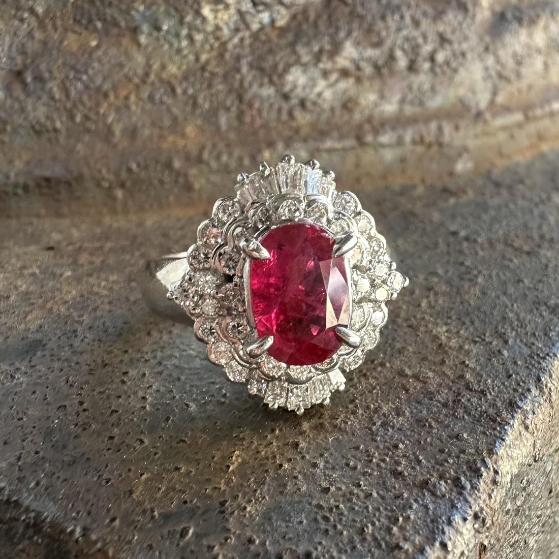 GIA Certified Platinum Ruby Diamond Cluster Cocktail Ring Size 5: GIA Certified Platinum Ruby Diamond Cluster Cocktail Ring Size 5 This platinum cocktail ring features a vivid red, natural ruby at its center, certified by GIA. The oval brilliant cut ruby weighs exac