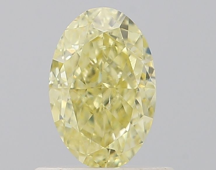 Loose Diamond - OVAL 0.71ct Fancy Yellow SI2: Loose Diamond - OVAL 0.71ct Fancy Yellow SI2 Source: Natural Shape: OVAL Carats: 0.71 Color: Fancy Yellow Certification: GIA Video: