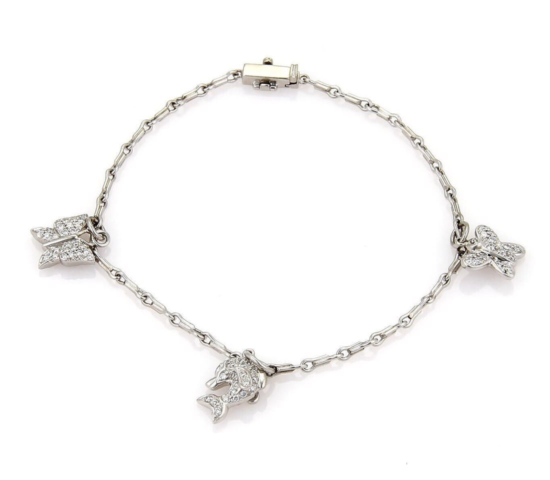 Vintage PT950 Platinum Bracelet with 3 Diamond Charms Double Link: Vintage PT950 Platinum Bracelet with 3 Diamond Charms Double Link This vintage estate bracelet is crafted in platinum and features a double chain link design with three diamond-set charms. It is marke
