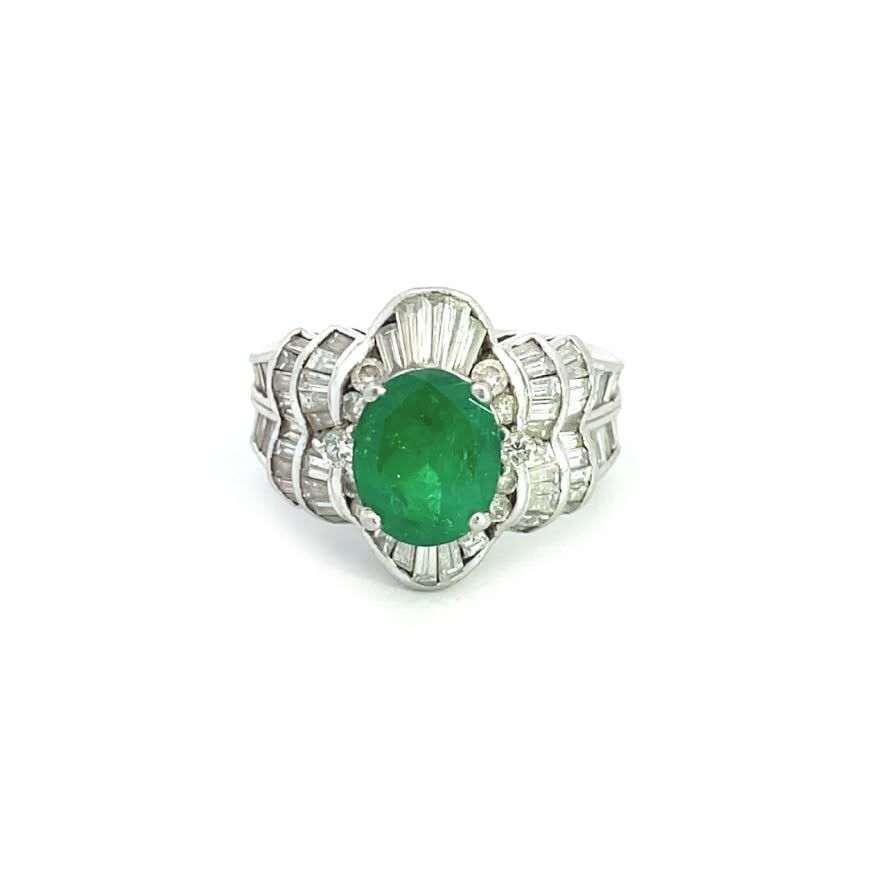 Vintage Platinum Floral Cocktail Ring 4ct Emerald and Diamonds Size 6: Vintage Platinum Floral Cocktail Ring 4ct Emerald and Diamonds Size 6 This exquisite vintage cocktail ring showcases a stunning 2.00 carat oval emerald at its center, embraced by a floral design of 2.