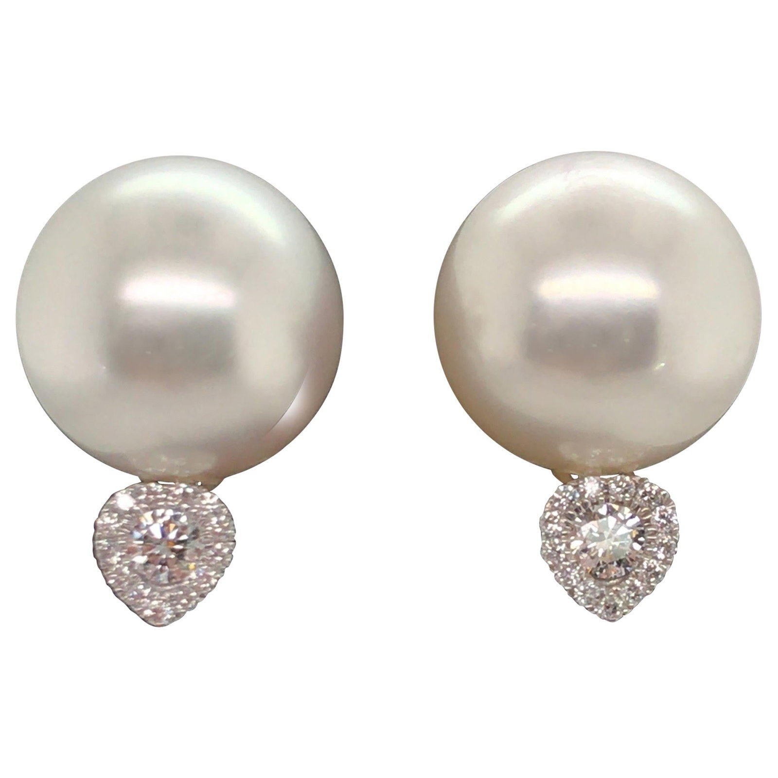 Harbor Diamonds 18K White Gold Heart Earrings South Sea Pearls 0.17 Carat Diamonds: Harbor Diamonds 18K White Gold Heart Earrings South Sea Pearls 0.17 Carat Diamonds Elevate your elegance with these stunning heart-shaped earrings crafted in 18K white gold. Each earring features two 