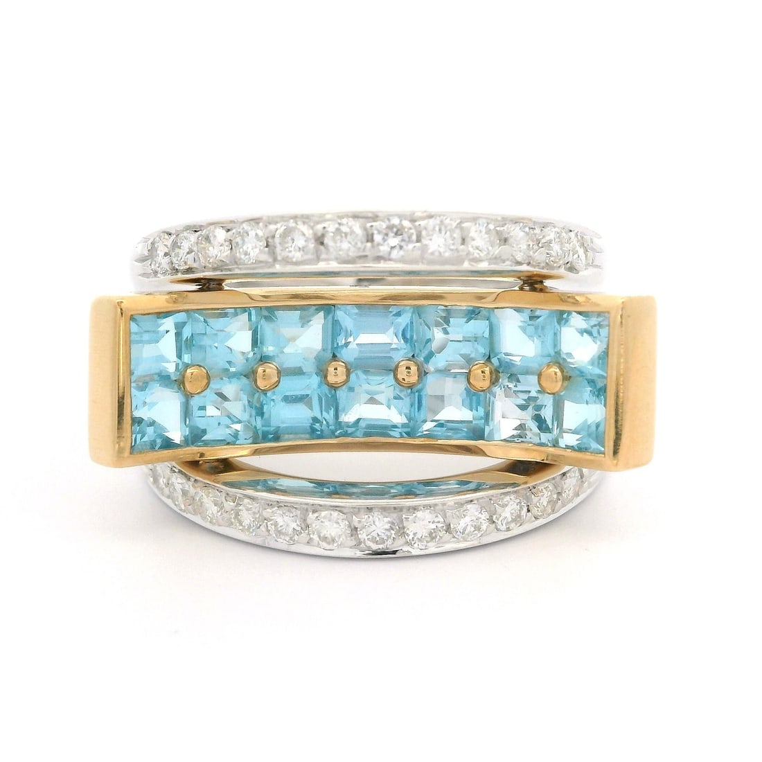 18k Two Tone Gold Modern Geometric Ring with 2.48ct Blue Topaz and Diamonds: 18k Two Tone Gold Modern Geometric Ring with 2.48ct Blue Topaz and Diamonds This stunning 18k two-tone gold ring features a modern concave geometric design, showcasing a captivating array of blue topa