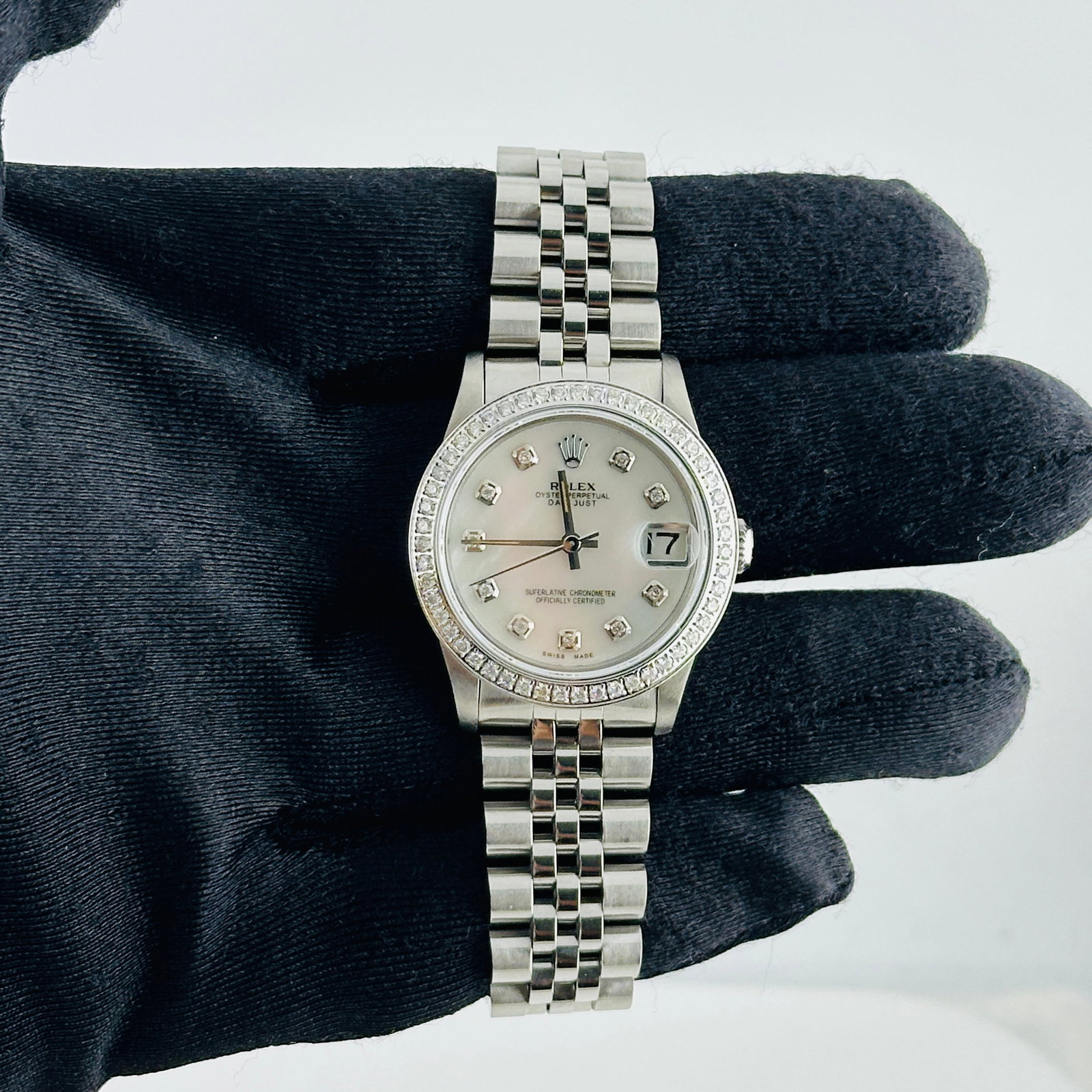 Rolex Ladies Datejust 68240 Diamond Bezel White MOP Dial D-Link Jubilee Watch: Rolex Ladies Datejust 68240 Diamond Bezel White MOP Dial D-Link Jubilee Watch This ladies Rolex Datejust features an Aftermarket white mother of pearl diamond dial, complemented by a diamond bezel and