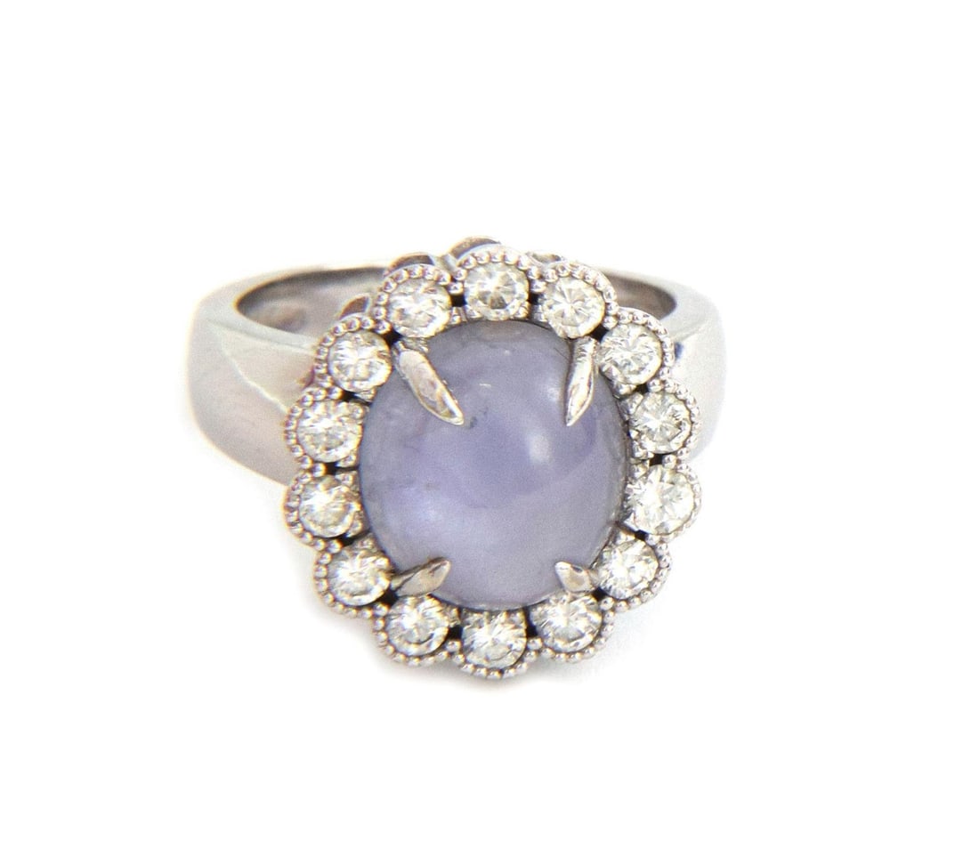 16.46ct Star Sapphire Diamond Ring in 14k White Gold Vintage Cocktail Style: 16.46ct Star Sapphire Diamond Ring in 14k White Gold Vintage Cocktail Style This exquisite vintage ladies' cocktail ring features a stunning 16.46 ct star sapphire, elegantly set in 14k white gold. Th