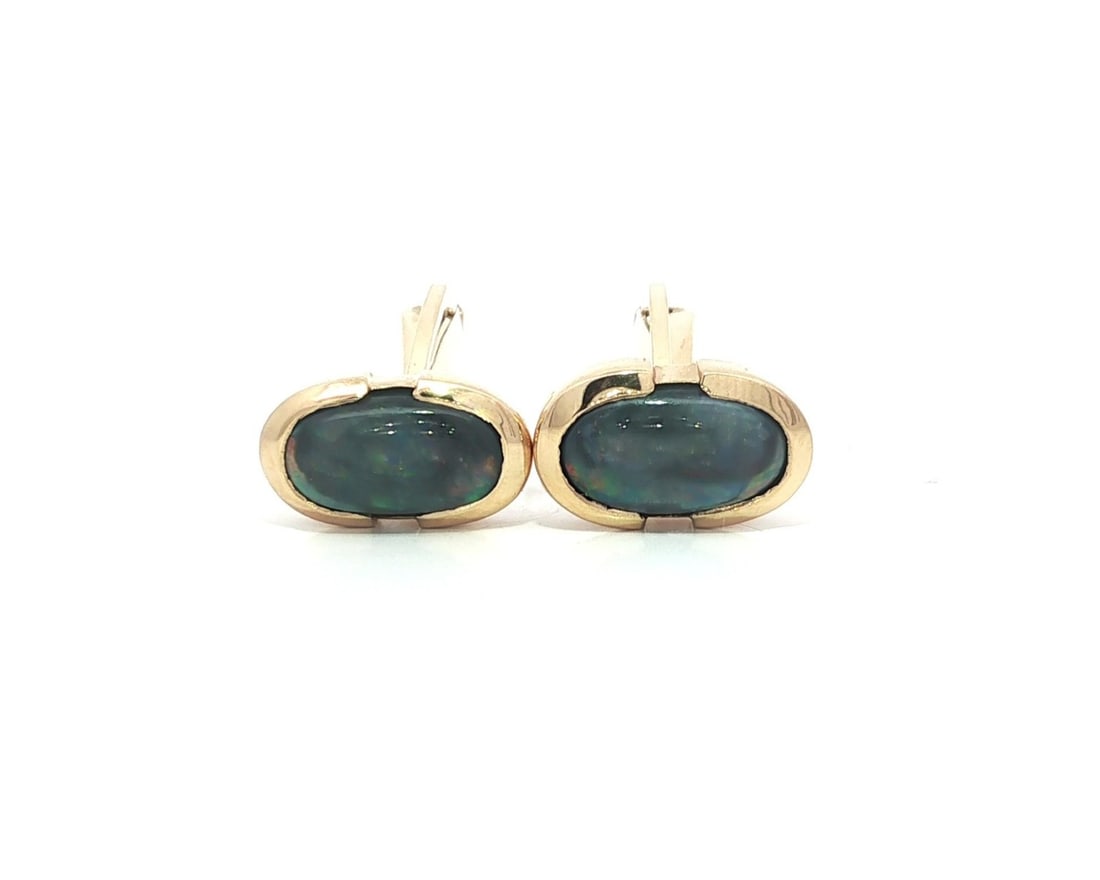 Vintage 14k Yellow Gold Black Opal Cufflinks Natural Gemstones: Vintage 14k Yellow Gold Black Opal Cufflinks Natural Gemstones Elevate your style with these vintage cufflinks, expertly crafted from 14k solid yellow gold. Each cufflink features a stunning natural b