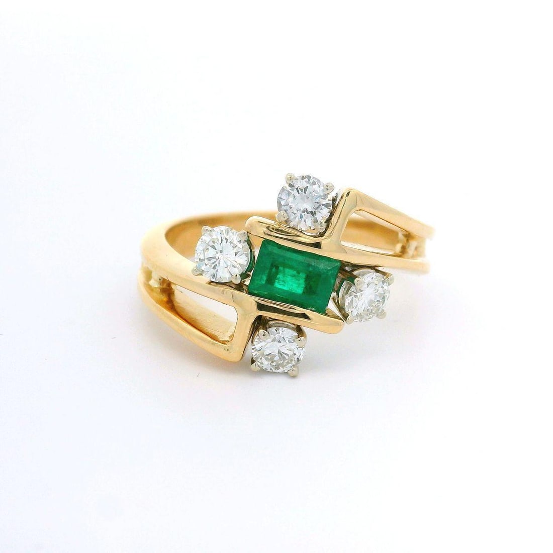 18k Yellow Gold Emerald Diamond Cocktail Ring Open Work Design: 18k Yellow Gold Emerald Diamond Cocktail Ring Open Work Design This exquisite cocktail ring is crafted from 18k yellow gold and features a stunning natural emerald at its center. The emerald, cut in a