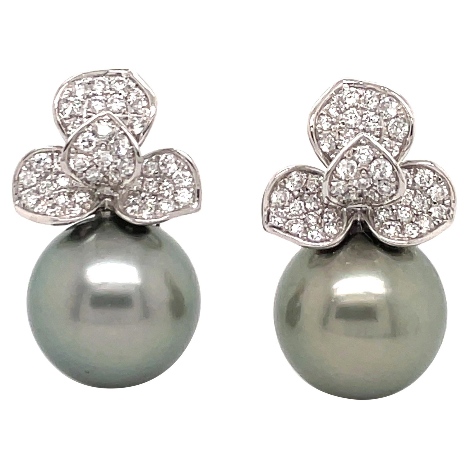 18KT White Gold Floral Drop Earrings with South Sea Pearls and 0.98ct Diamonds: 18KT White Gold Floral Drop Earrings with South Sea Pearls and 0.98ct Diamonds These exquisite Diamond Petal Floral Drop Earrings are crafted from 18KT white gold, showcasing a contemporary design. Ea