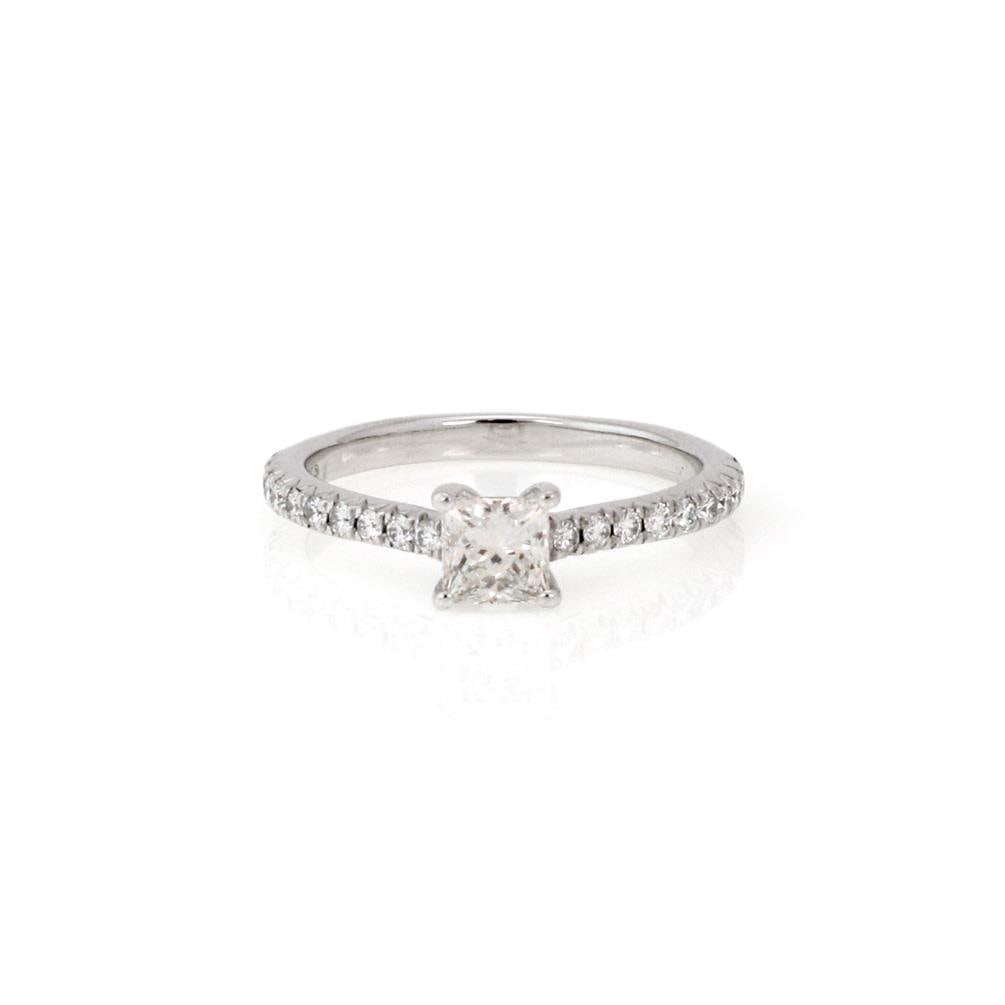Tiffany & Co Platinum Engagement Ring 0.40ct Princess Cut Diamond Size 4: Tiffany & Co Platinum Engagement Ring 0.40ct Princess Cut Diamond Size 4 This exquisite engagement ring from Tiffany & Co. showcases a stunning 0.40ct princess cut diamond set in a luxurious platinum 