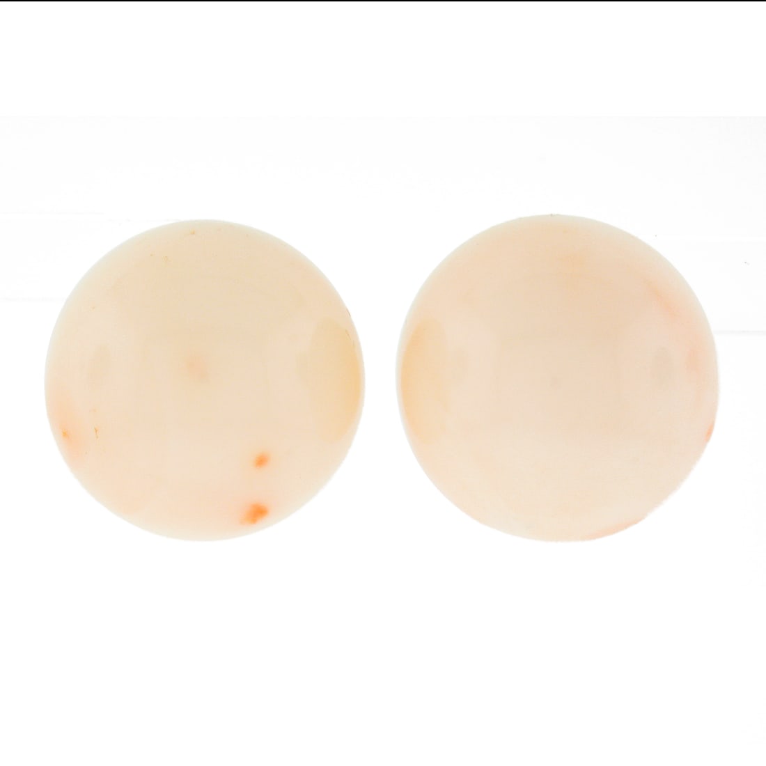 14K Yellow Gold Coral Bead Stud Earrings 15mm Butterfly Backs: 14K Yellow Gold Coral Bead Stud Earrings 15mm Butterfly Backs These stud earrings feature natural angel skin coral beads set in solid 14K yellow gold. Each earring displays a round, bead ball-shaped c