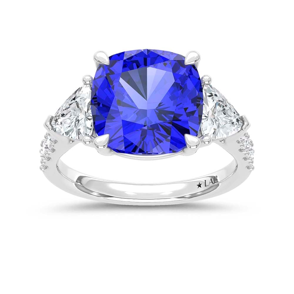 14K White Gold Lab Grown Diamond 9 Ct.Tw. Cushion Shape Recrystalized Blue Sapphire Engagement Ring: 14K White Gold Lab Grown Diamond 9 Ct.Tw. Cushion Shape Recrystalized Blue Sapphire Engagement Ring (Center 7 3/4 ct) Exude unparalleled elegance with this 14K white gold engagement ring, featuring a 