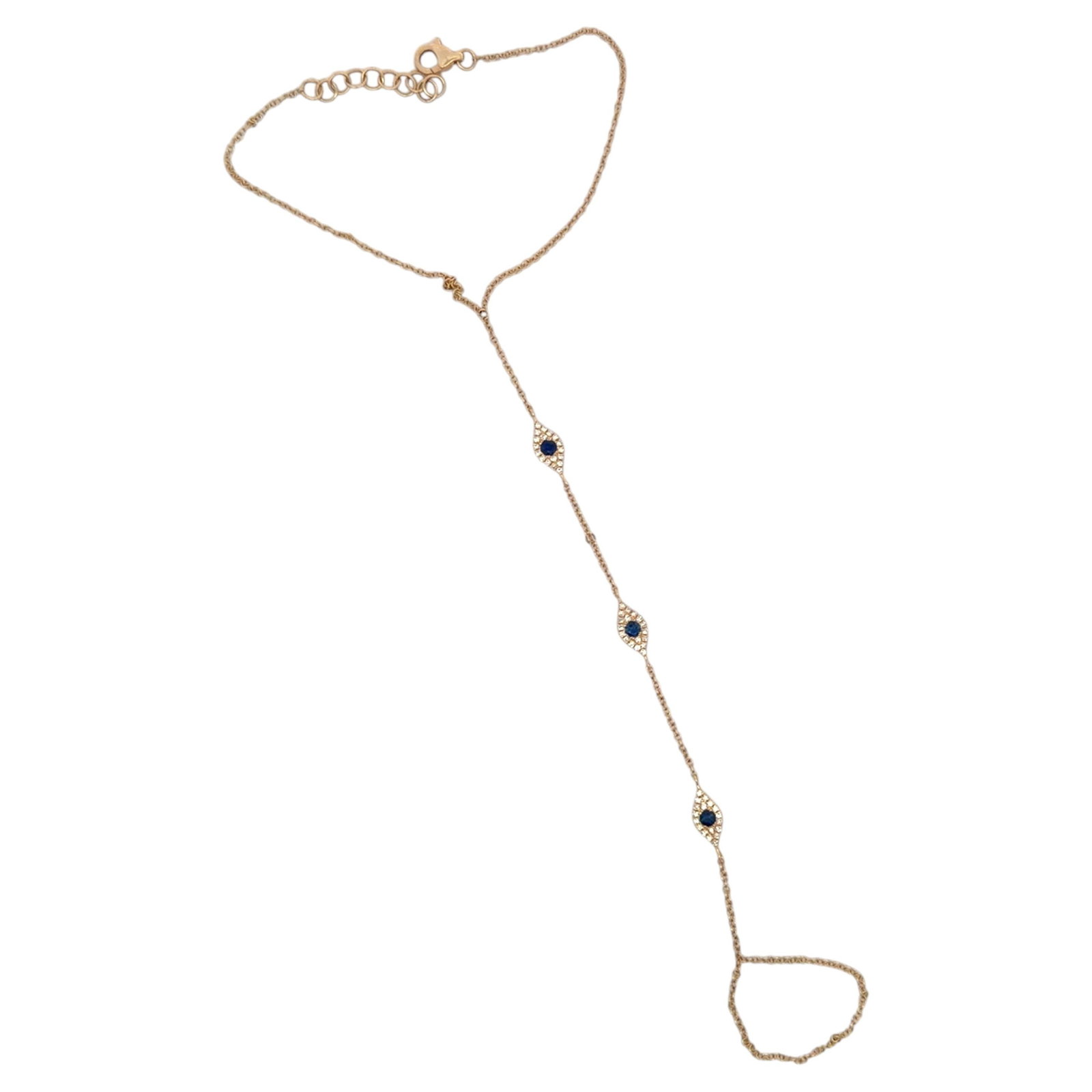 14K Gold Evil Eye Hand Chain Ring Bracelet with Diamonds and Sapphire: 14K Gold Evil Eye Hand Chain Ring Bracelet with Diamonds and Sapphire This contemporary 14K yellow gold hand chain bracelet features an elegant design connecting the wrist to the finger with three evi
