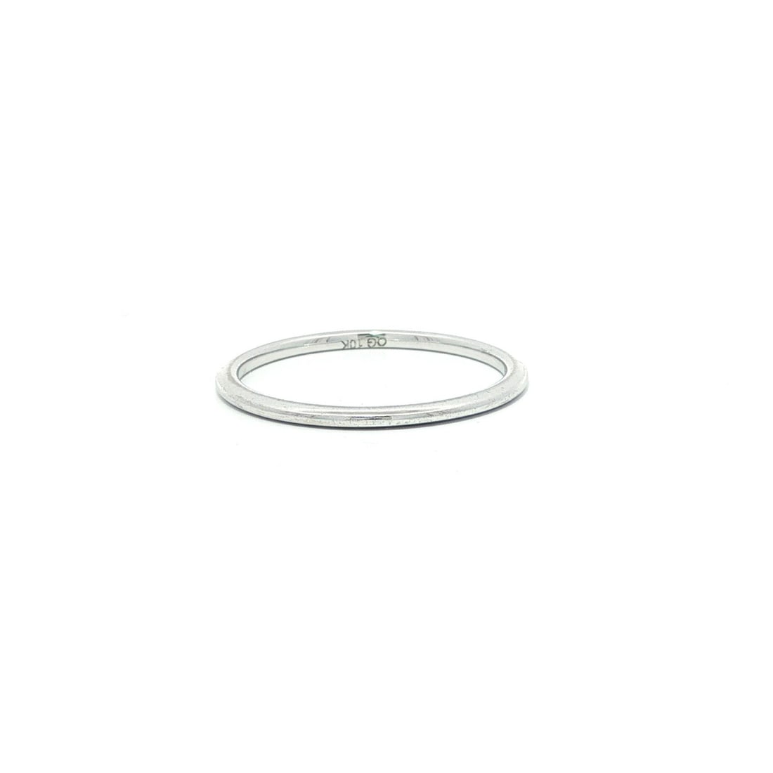 10k White Gold Stackable Dainty Band Ring Size 6.5 1.2mm: 10k White Gold Stackable Dainty Band Ring Size 6.5 1.2mm This dainty band ring is crafted from solid 10k white gold and features a polished finish. With a narrow 1.2mm width and a rise of 1.6mm off th