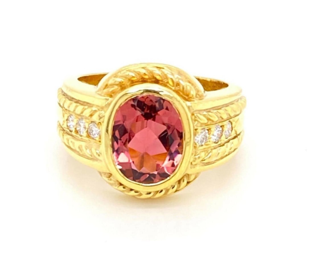 Judith Ripka 18k Yellow Gold Ring with Pink Tourmaline and Diamonds Size 6: Judith Ripka 18k Yellow Gold Ring with Pink Tourmaline and Diamonds Size 6 A signed Judith Ripka fine jewelry ring crafted in 18k yellow gold. The design features a pink tourmaline accented by diamond