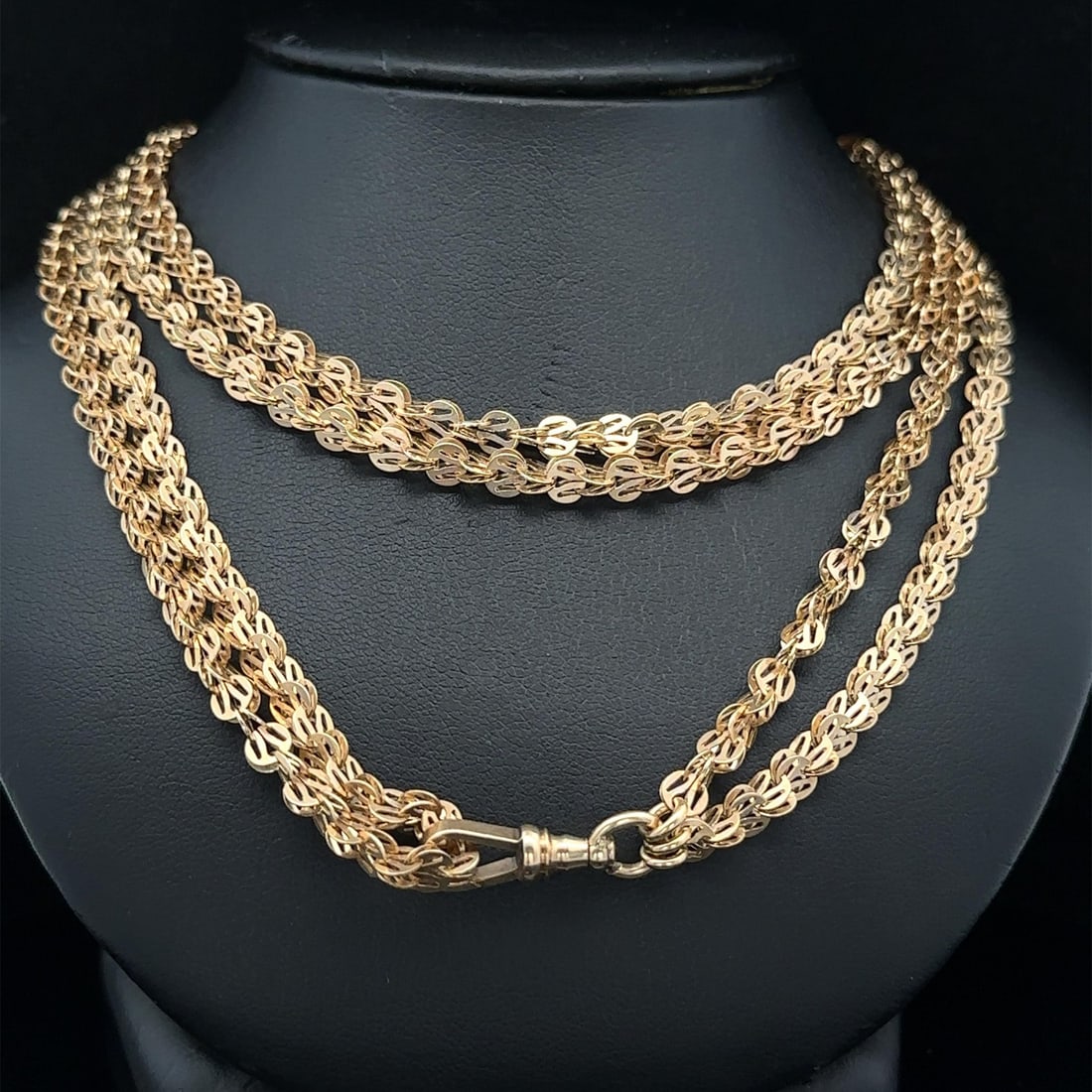 Vintage 67 Inch Solid 13-14k Yellow Gold Unique Link Chain with Dog Clip: Vintage 67 Inch Solid 13-14k Yellow Gold Unique Link Chain with Dog Clip This exquisite vintage wrap chain necklace features a unique link design, crafted from solid 13-14k yellow gold. Measuring an i