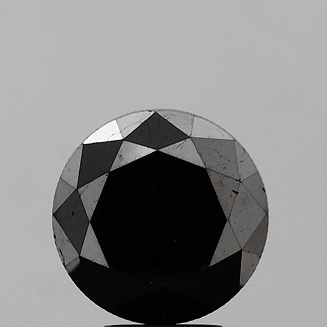 Loose Diamond - ROUND 5.99ct Fancy Black VVS2: Loose Diamond - ROUND 5.99ct Fancy Black VVS2 Source: Natural Shape: ROUND Carats: 5.99 Color: Fancy Black Certification: NONE Video: