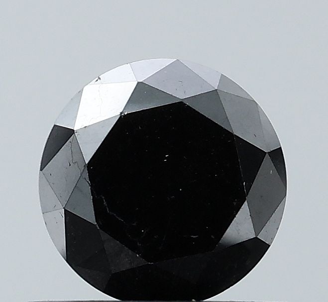 Loose Diamond - ROUND 0.77ct Fancy Black VS2: Loose Diamond - ROUND 0.77ct Fancy Black VS2 Source: Natural Shape: ROUND Carats: 0.77 Color: Fancy Black Certification: NONE Video: