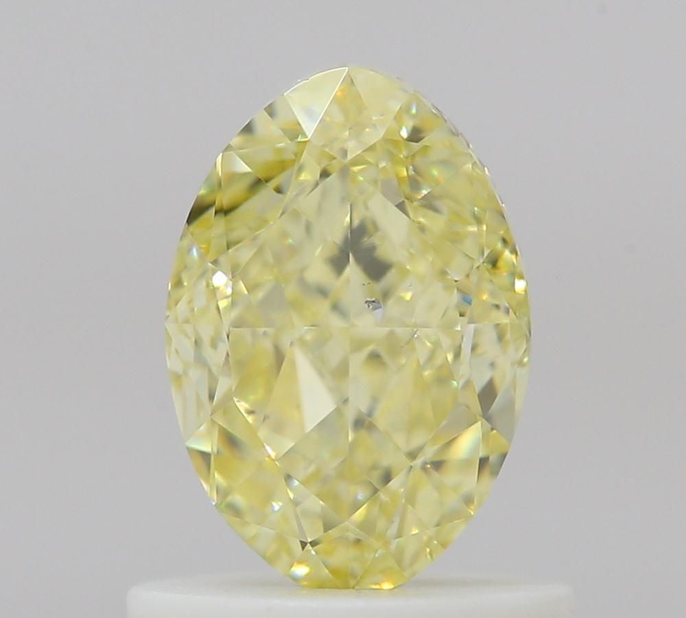 Loose Diamond - OVAL 1.01ct Fancy Yellow SI2: Loose Diamond - OVAL 1.01ct Fancy Yellow SI2 Source: Natural Shape: OVAL Carats: 1.01 Color: Fancy Yellow Certification: GIA Video: