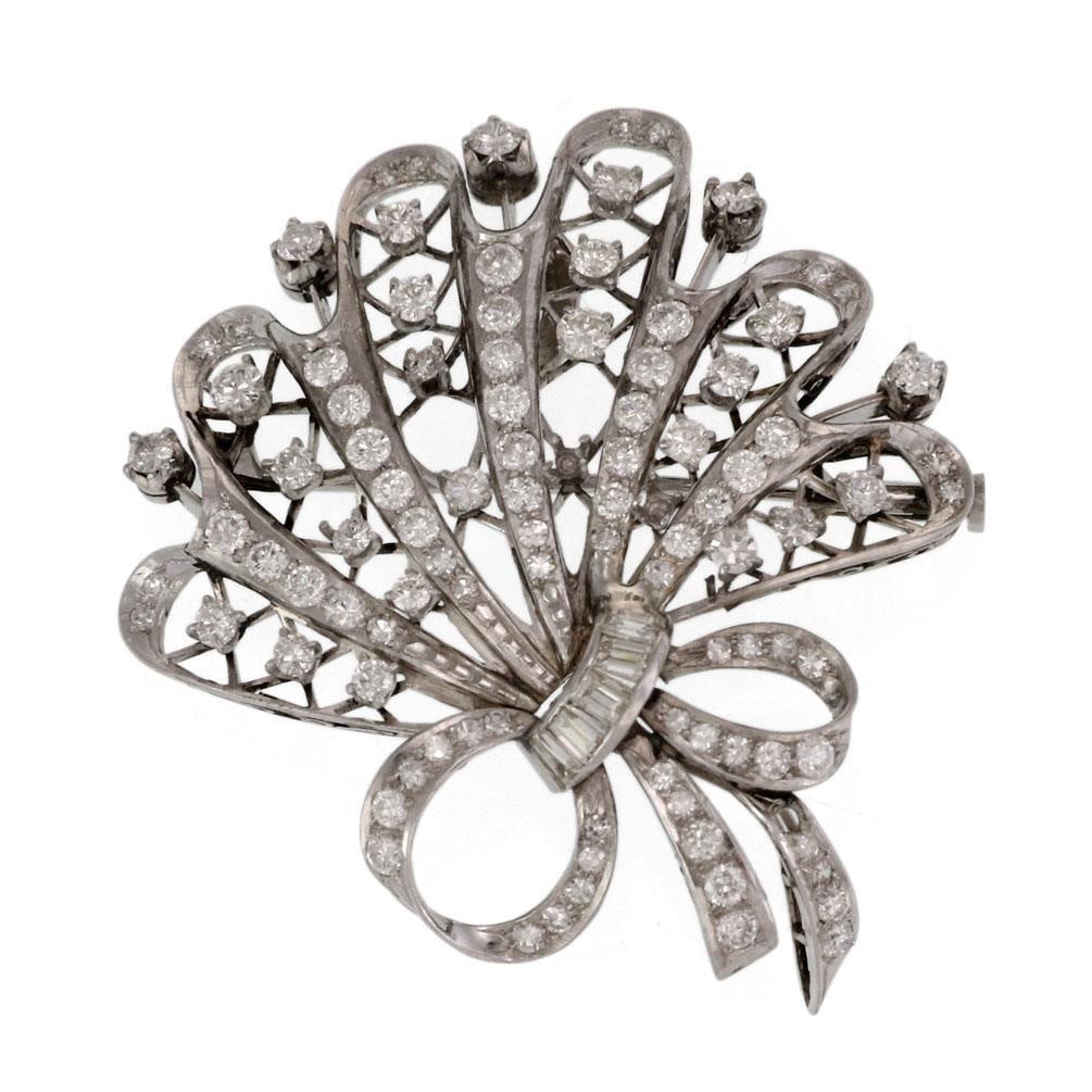 Stunning 2.50ct Diamond Platinum Floral Bow Brooch: Stunning 2.50ct Diamond Platinum Floral Bow Brooch This exquisite brooch is artfully crafted from platinum and showcases a captivating multi-loop open floral design adorned with a ribbon bow. It featu