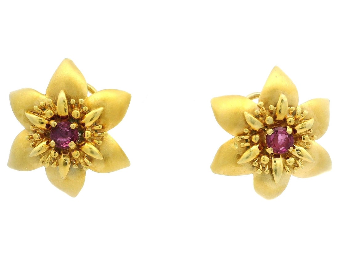Vintage 18k Yellow Gold Flower Earrings with 1ct Natural Ruby: Vintage 18k Yellow Gold Flower Earrings with 1ct Natural Ruby These exquisite Vintage 18k Yellow Gold Omega Earrings feature stunning natural rubies, expertly cut into round brilliant shapes. The earr
